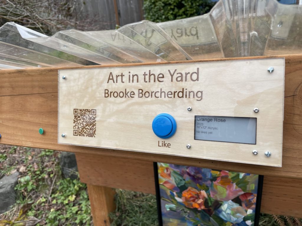 Art in the Yard sign with physical like button